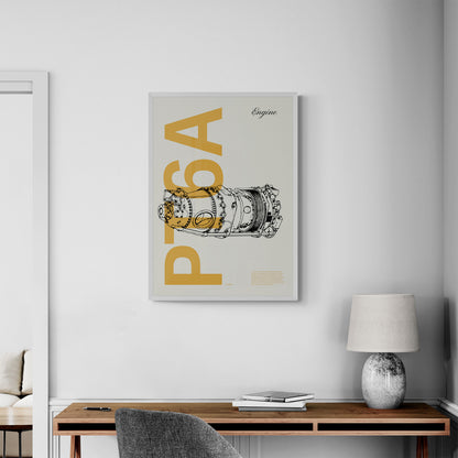 A framed poster hanging on a home office over a wooden desk and grey chair. It shows a PT6A aircraft engine in line drawing style with the word PT6A written big in mustard yellow