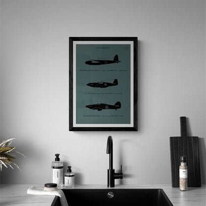 A framed poster hanging in a modern looking bathroom over a sink. I shows the profiles of three WW1 period aeroplanes in a black silhouette style over a dark green background 