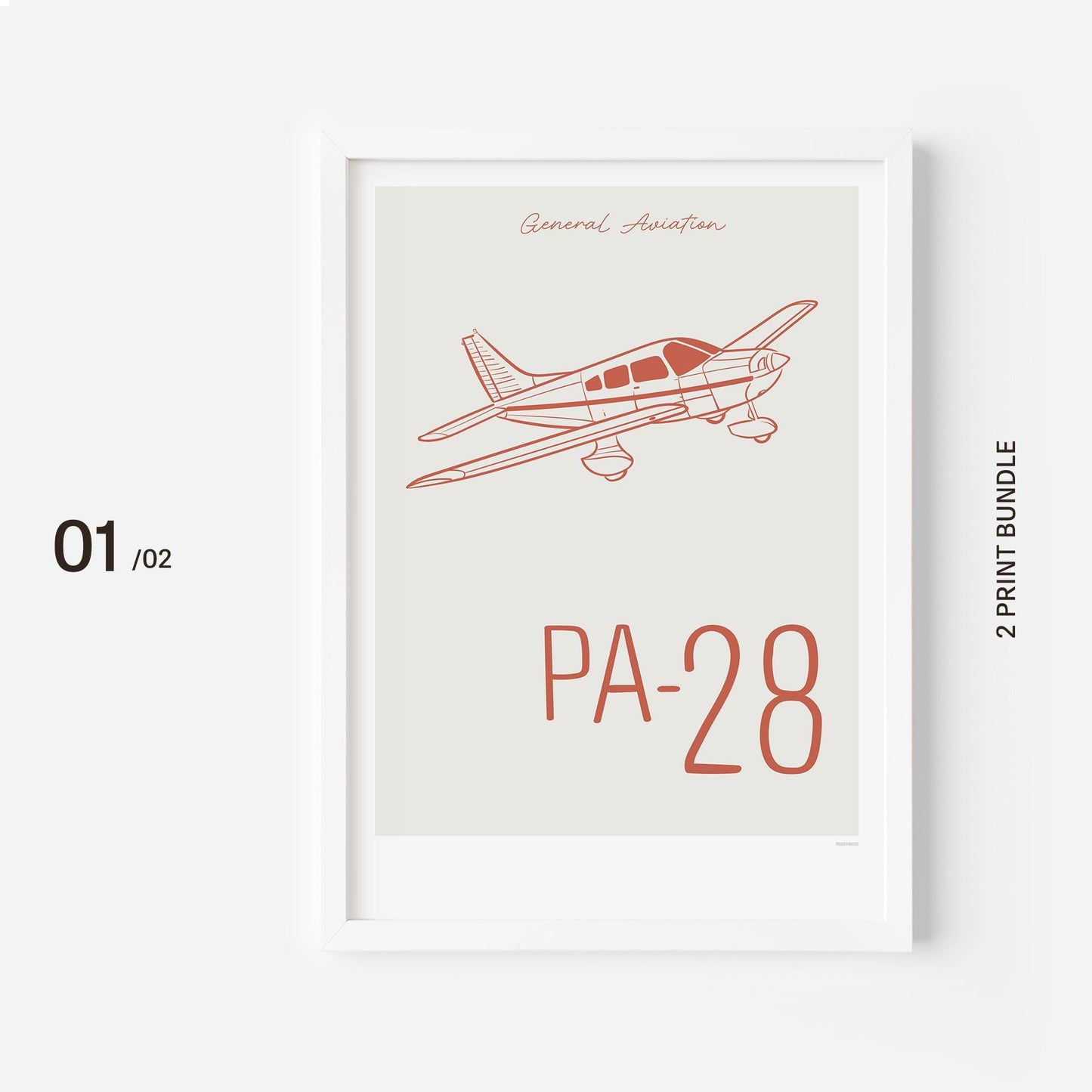 A poster on a white frame showing a light aircraft illustration with the words General Aviation and PA-28 in red